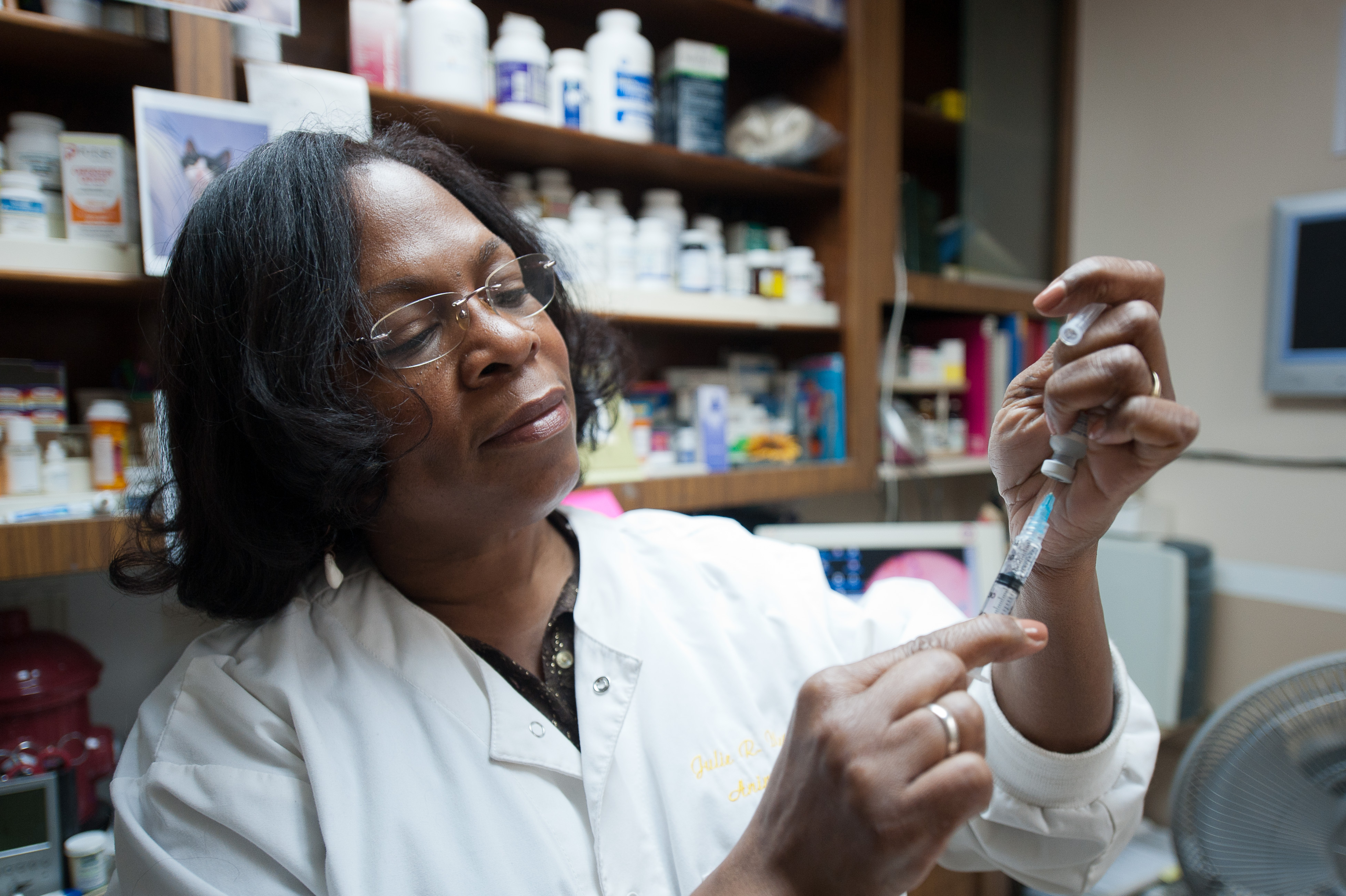 Julie Butler prepares an injection