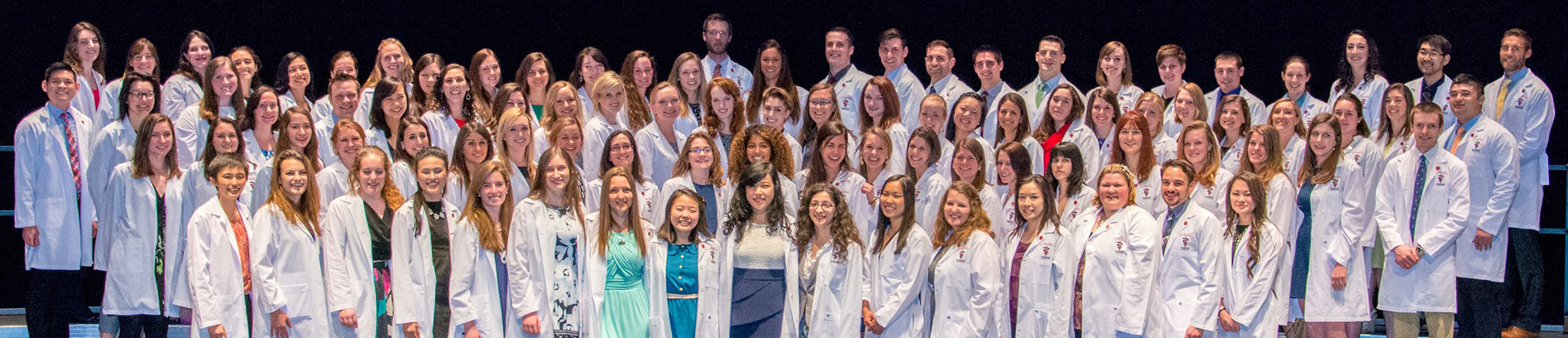 Image of DVM Graduating class in white coats