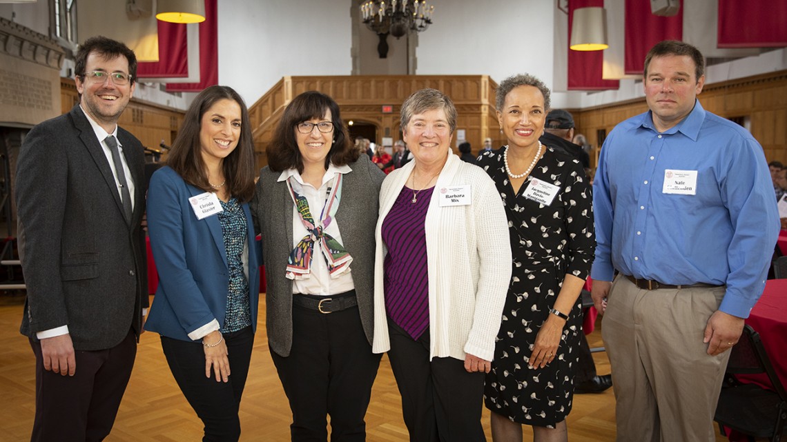 A group shot of the Hometown Alumni Award winners with President Pollack at Homecoming