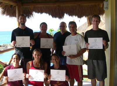 STUDENTS POSING WITH CERTIFICATES