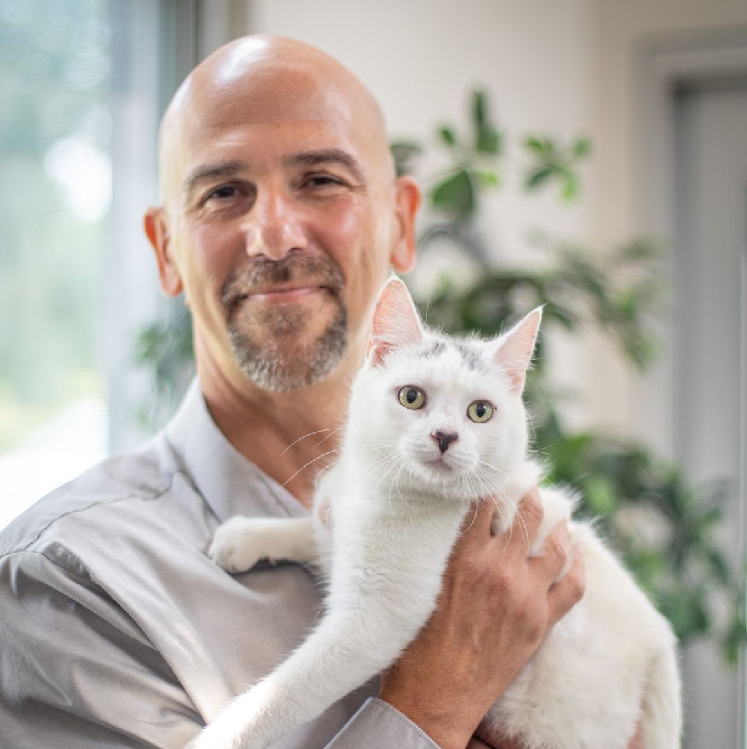 FHC director holding cat