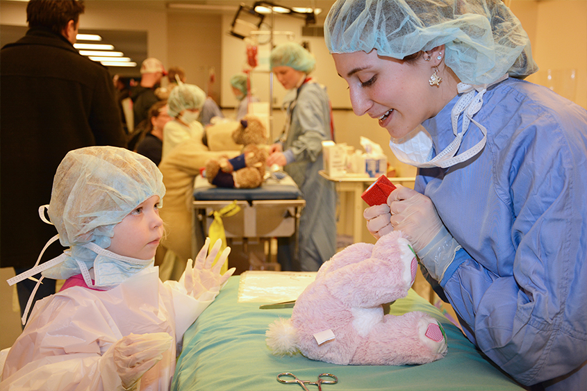 Student with child at Open House