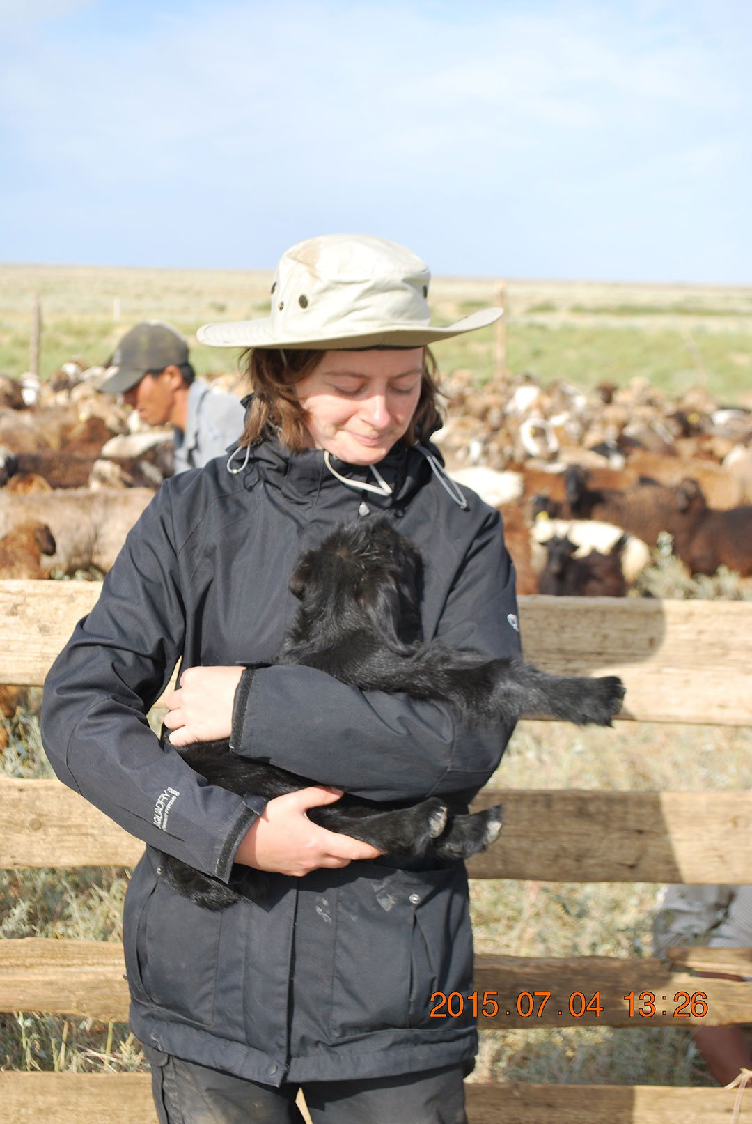 Wendy Beauvais holding a calf