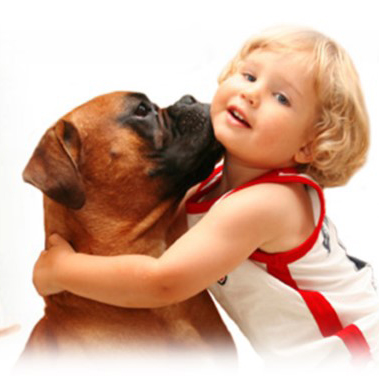 girl hugging a dog