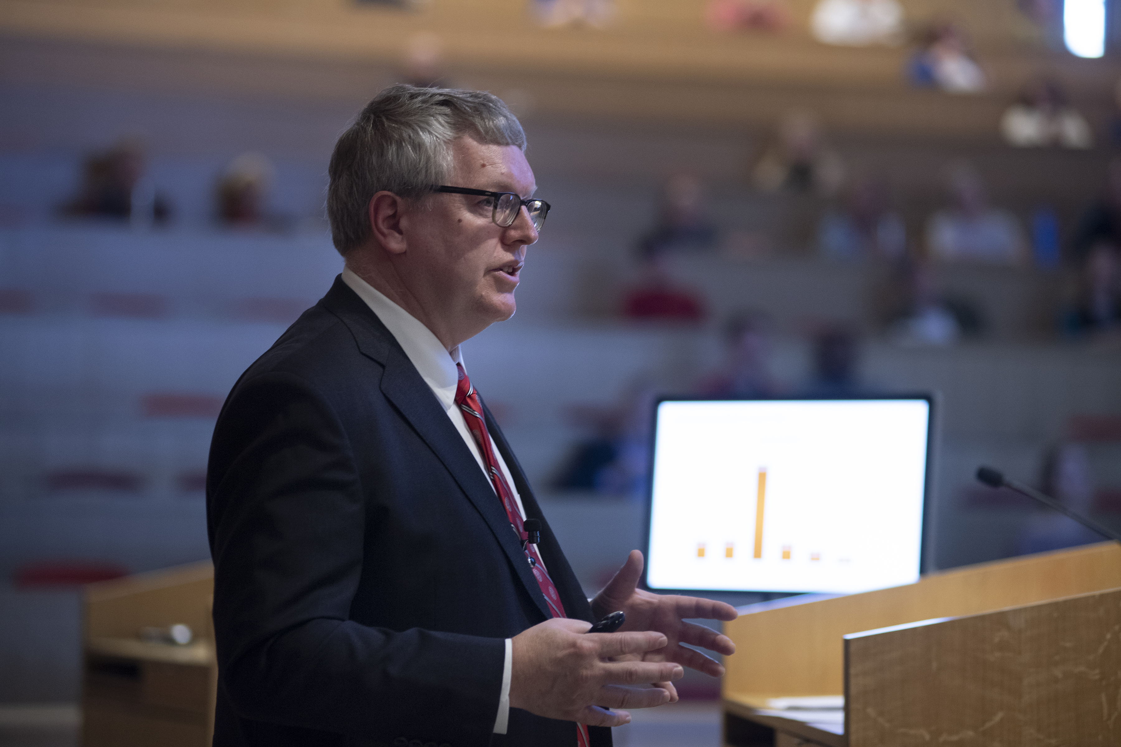 Dean Warnick speaks at a podium