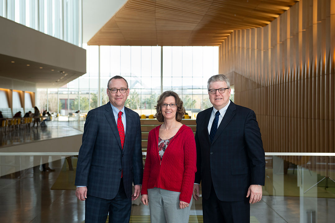 Dean Hallock, Dr. Korich, and Dean Warnick together in the CVM atrium