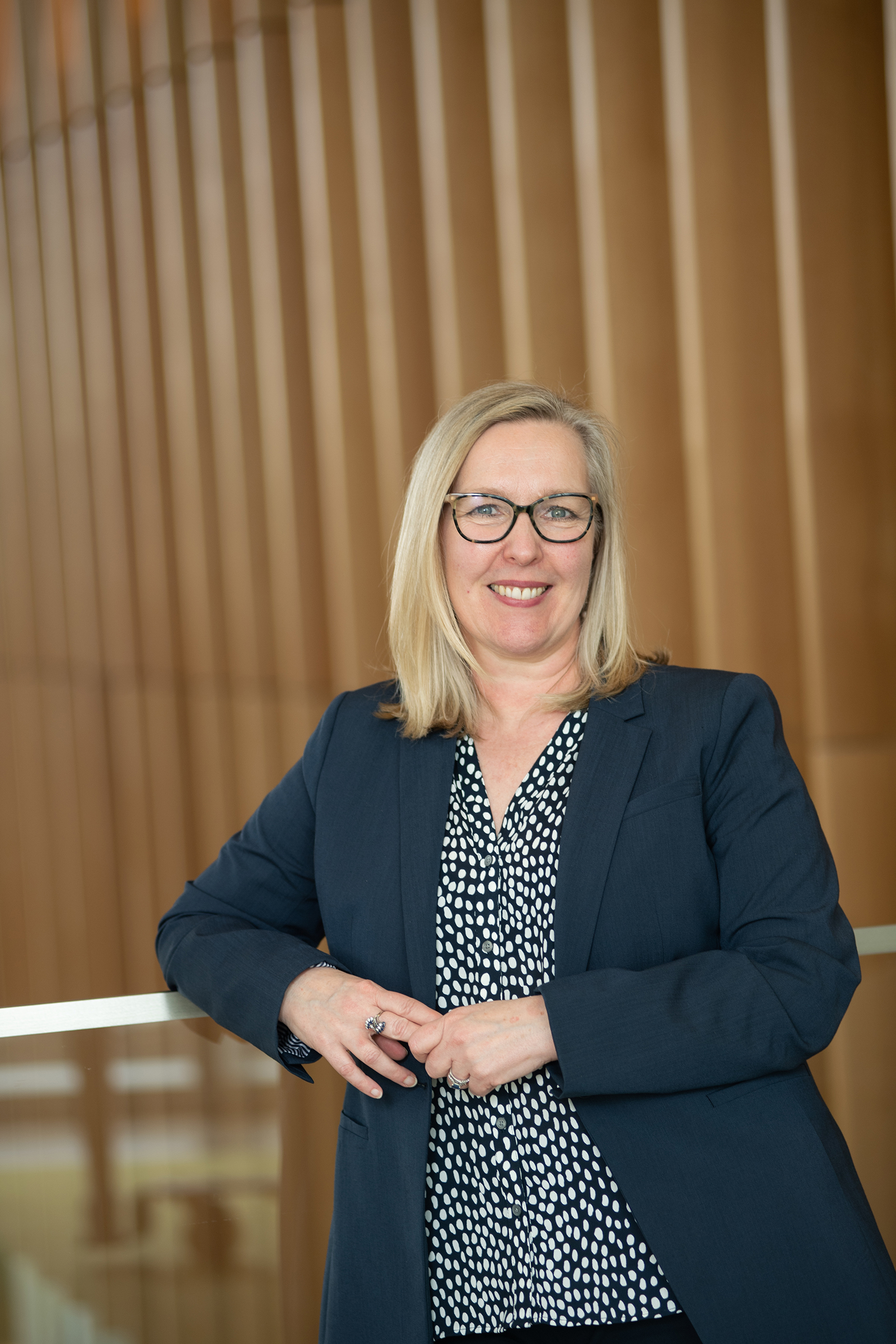 Dr. Deborah Fowell standing in the CVM atrium