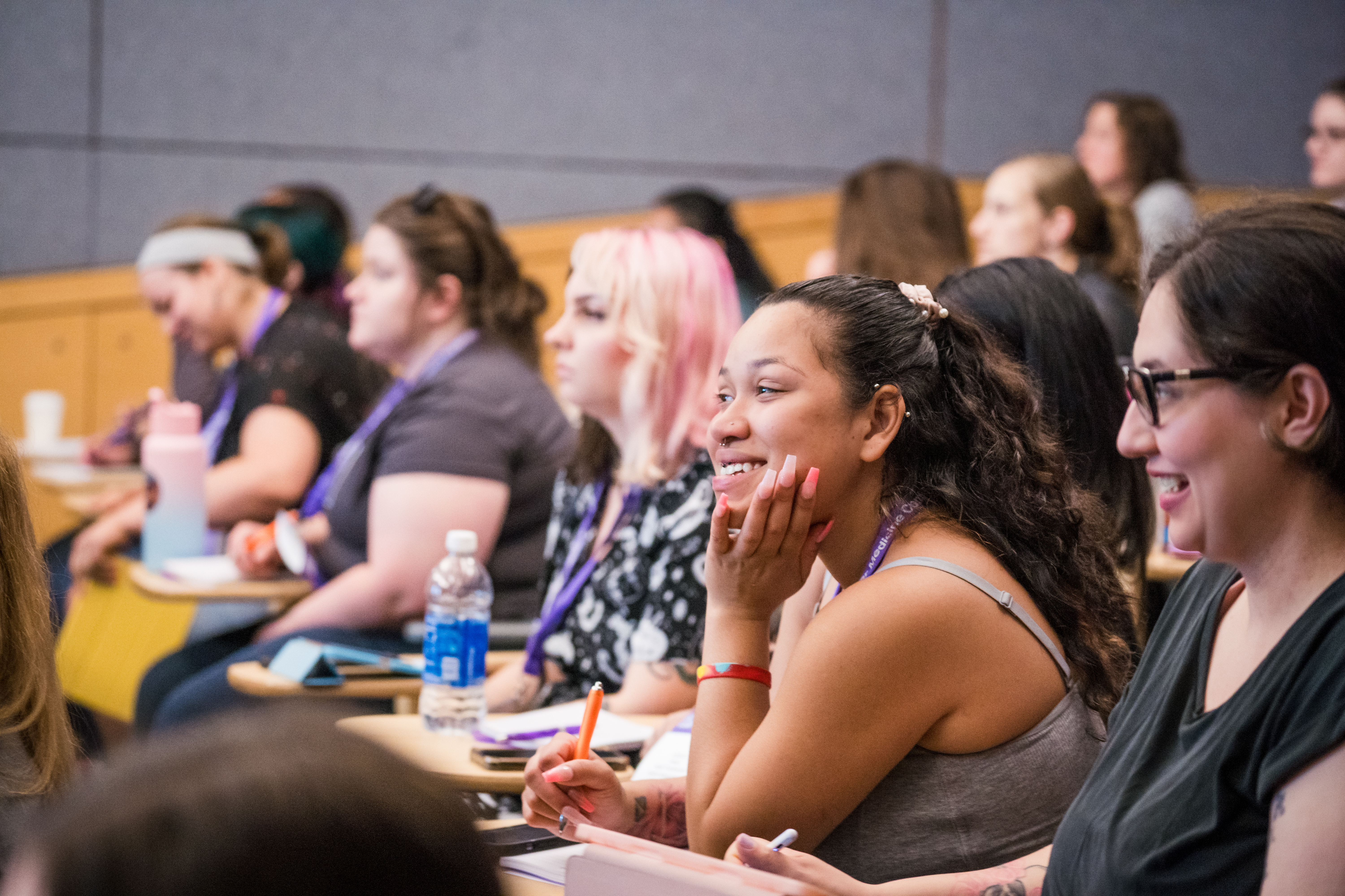 conference attendees in a lecture hall