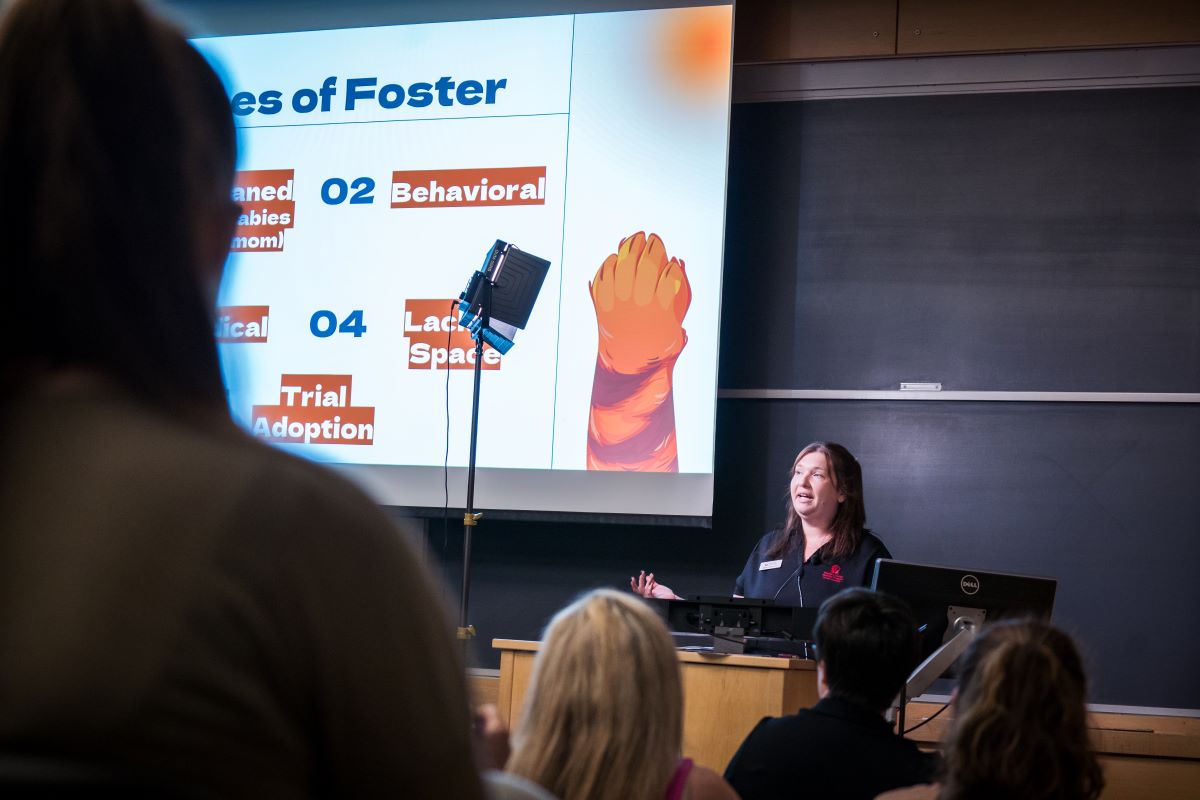 Woman speaking at shelter medicine conference