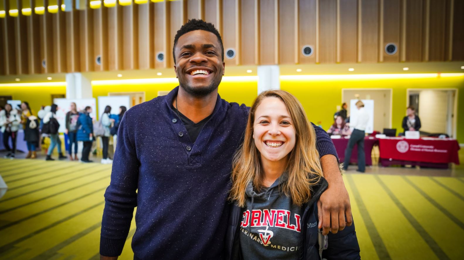 two DVM students in the CVM atrium