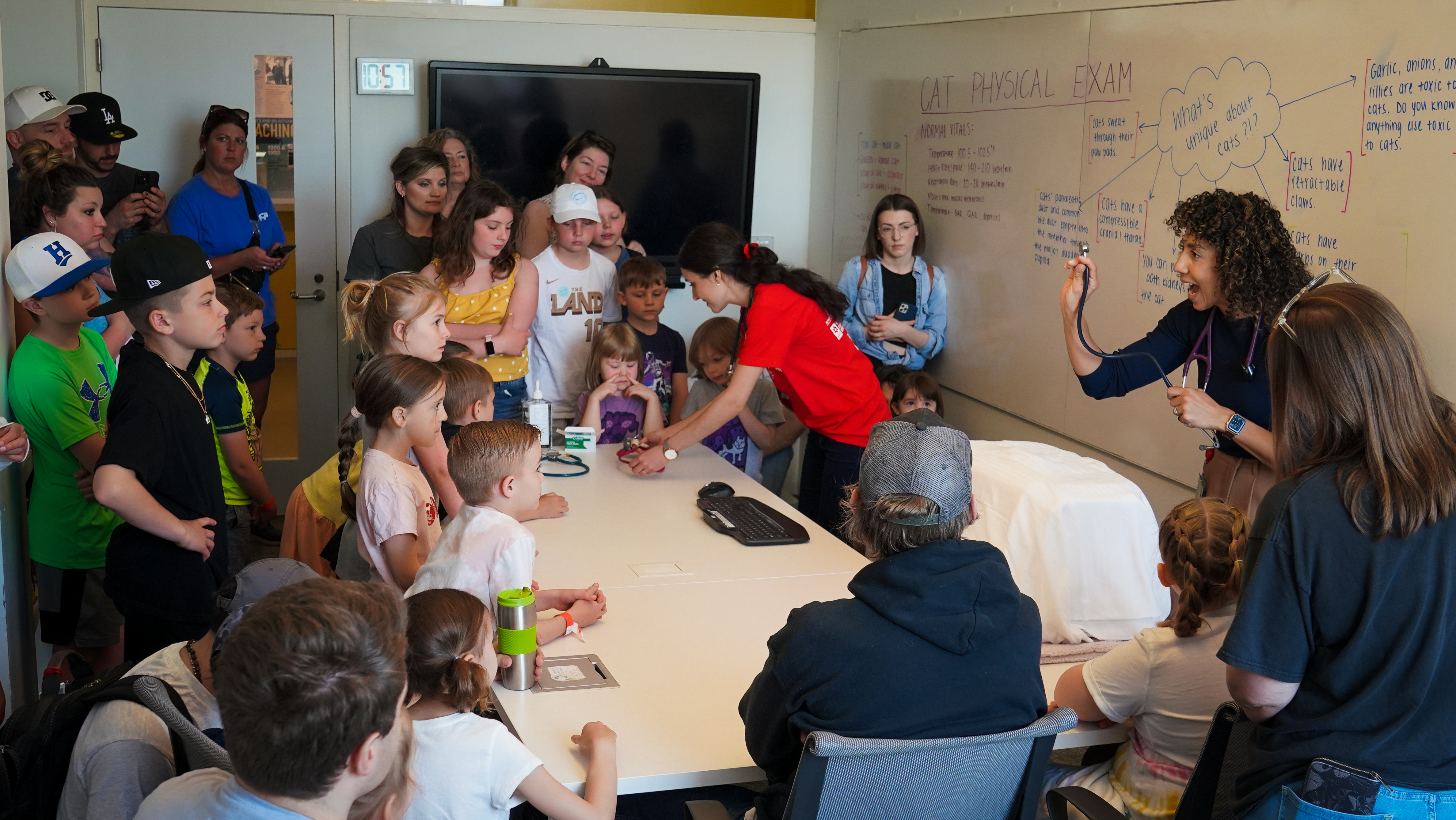 Veterinarian talking to a group of kids