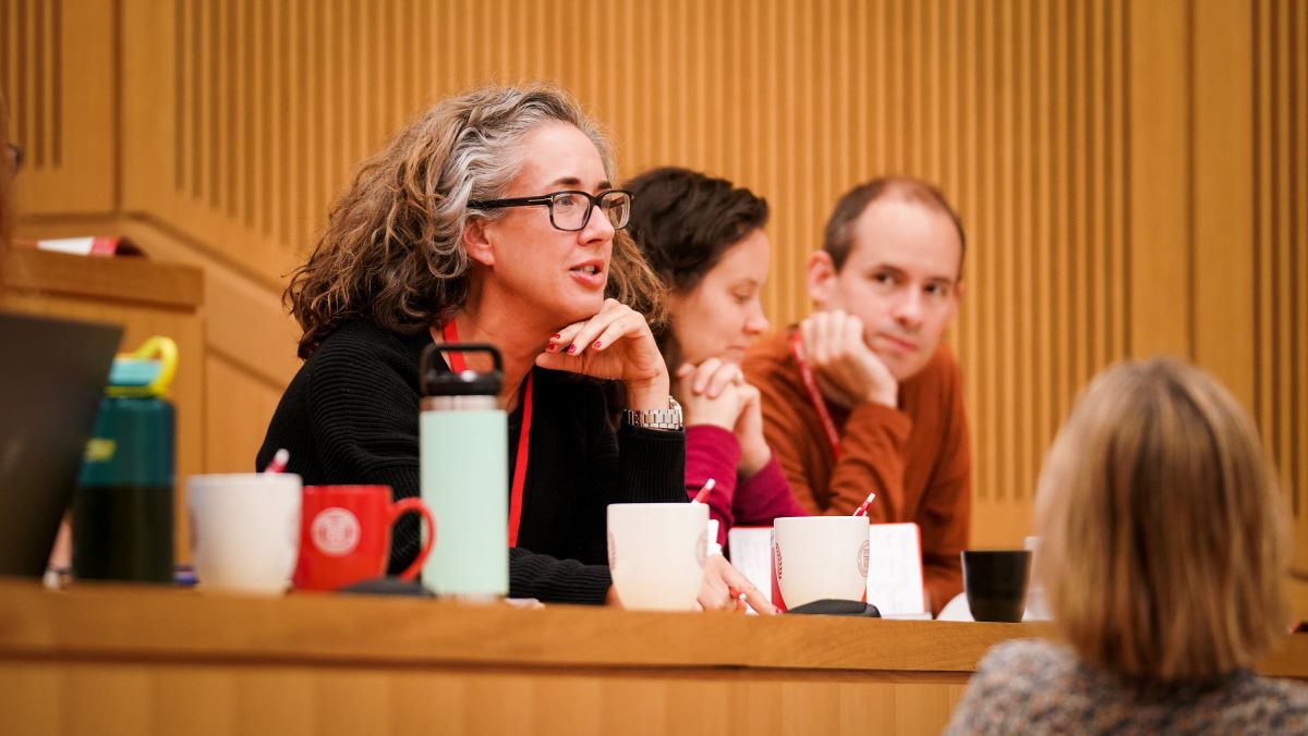 woman speaking in lecture hall