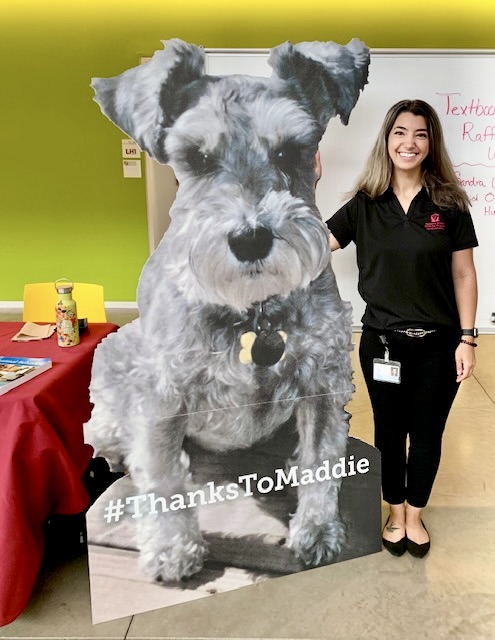 Dr. Emily Boccia poses with a Maddie cut-out