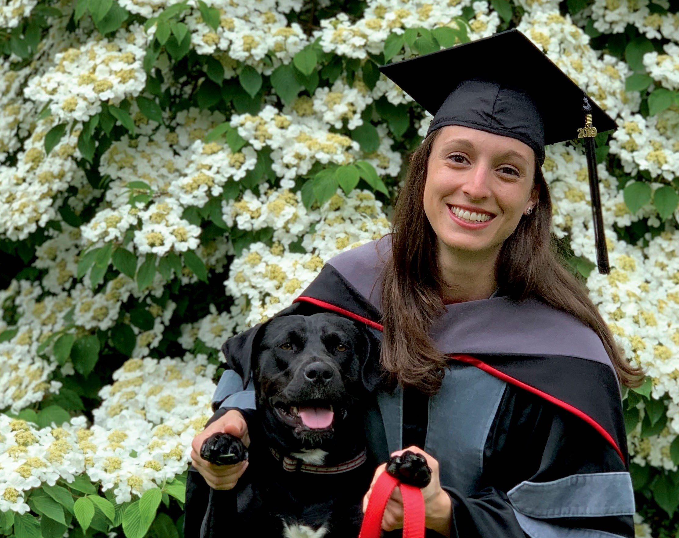 Dr. Suskin-Sperry next to canine