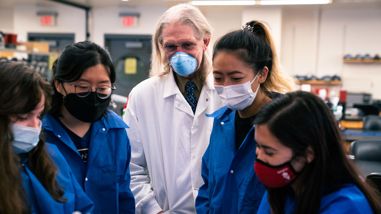 Dr. Dwight Bowman advises students in a lab