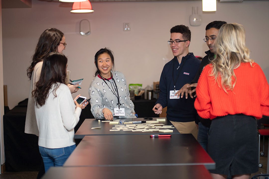 Students talking during the hackathon