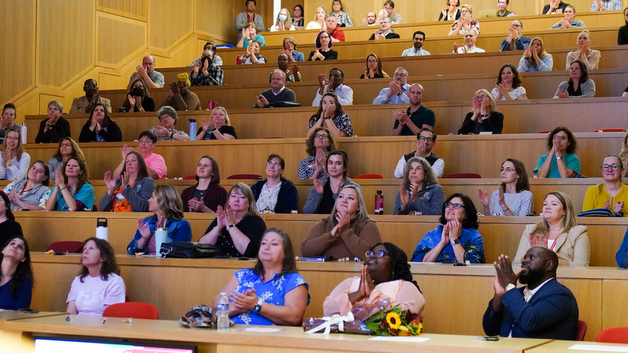 The attendees applaud at the Staff Appreciation Event