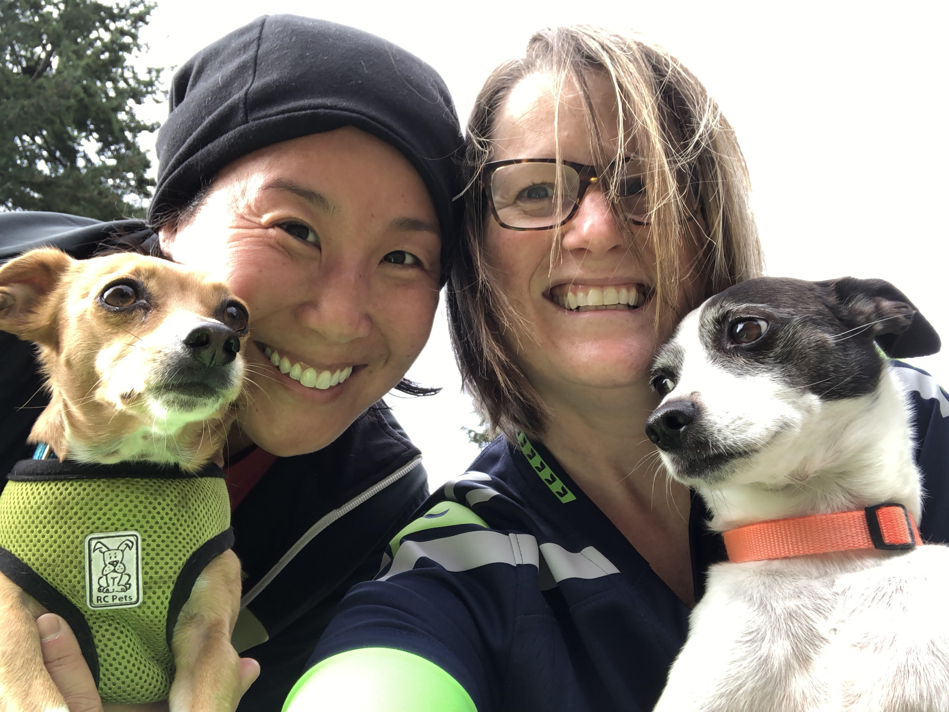 Carolyn Chow with her dogs and her partner