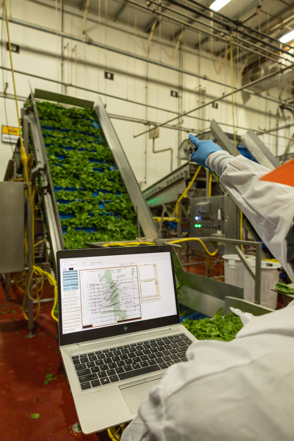 laptop with software in a food processing facility