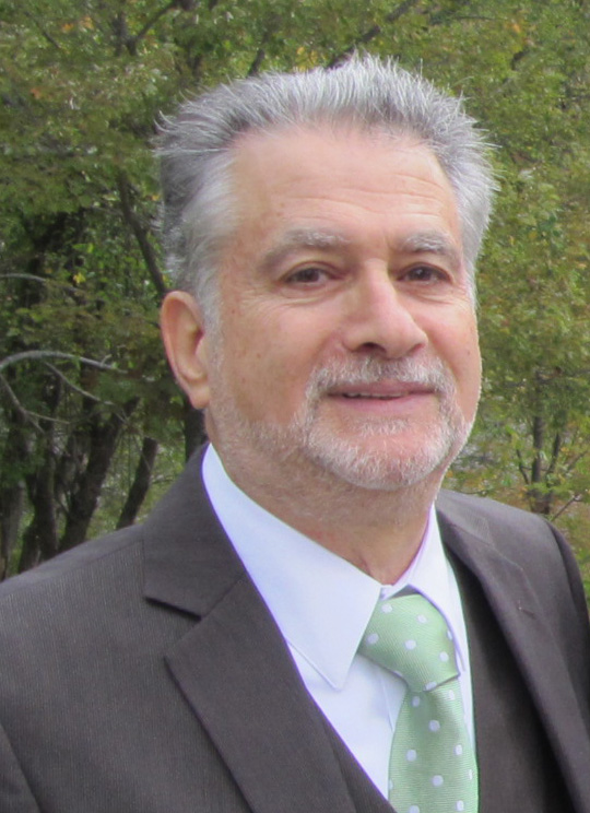 Dr. Jerrold Ward in a suit and tie for a headshot