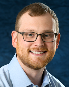 Headshot of Dr. John Loftus