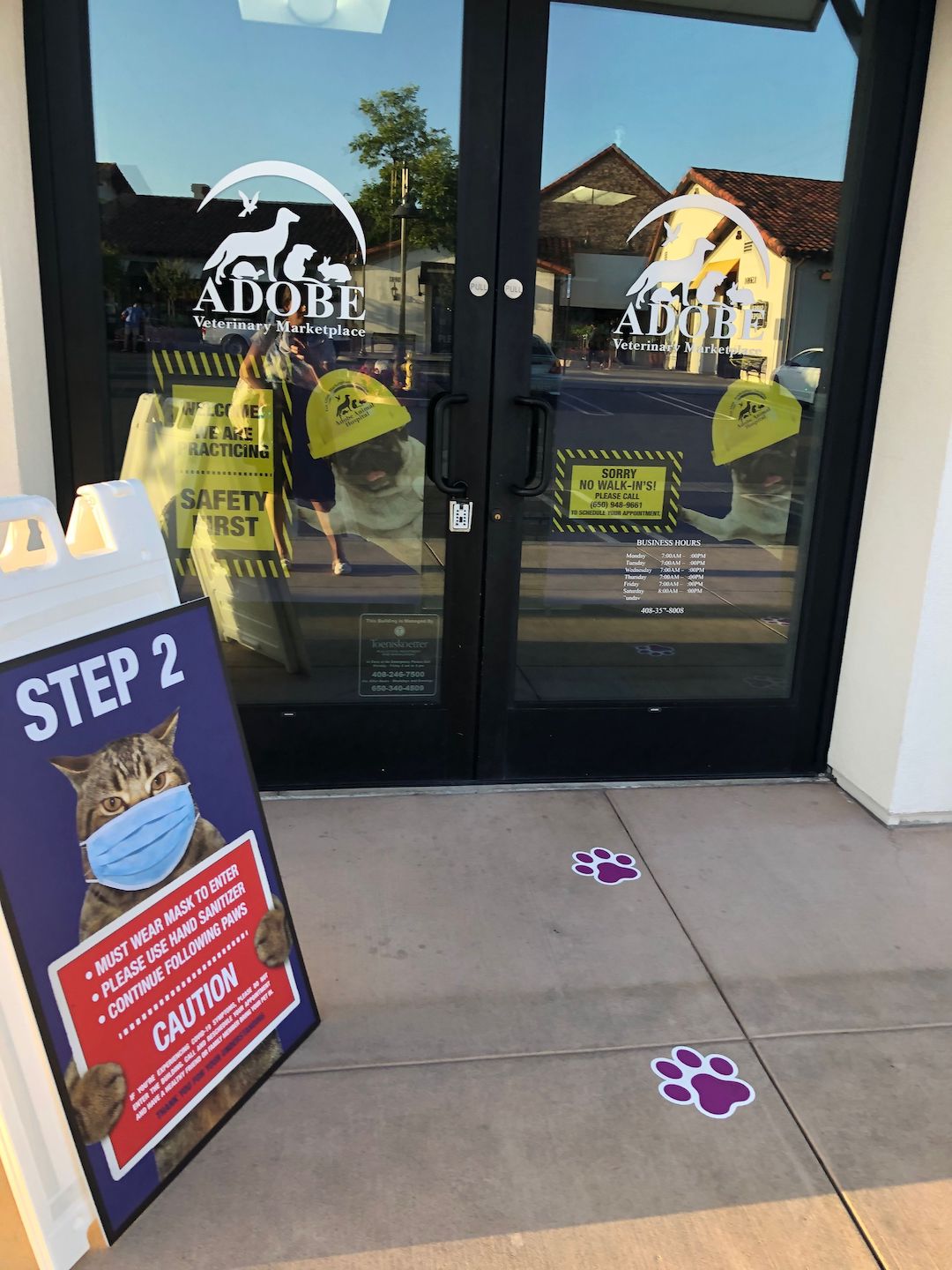 Pawprints pasted to the floor guide visitors through Dr. Koga's animal hospital in California