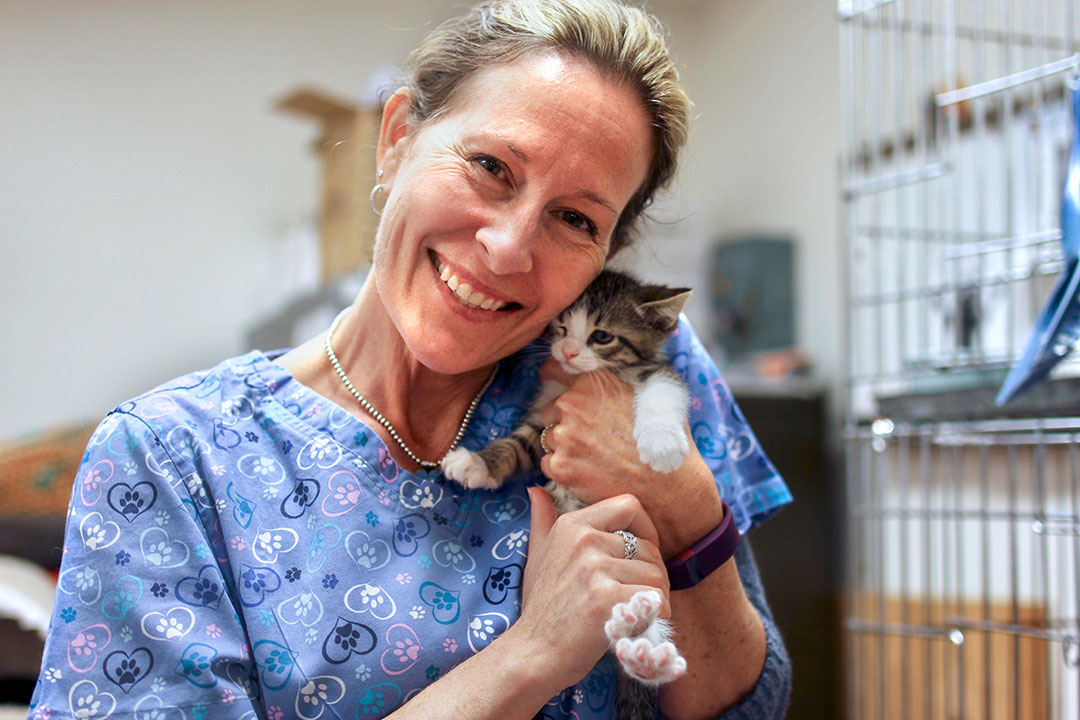 Laurie Peek holding a kitten
