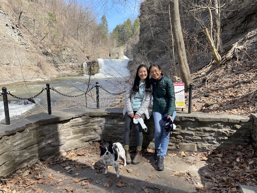 Lin with her mother and dog in front of Taughannock Falls