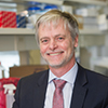 Dr. Schang in lab