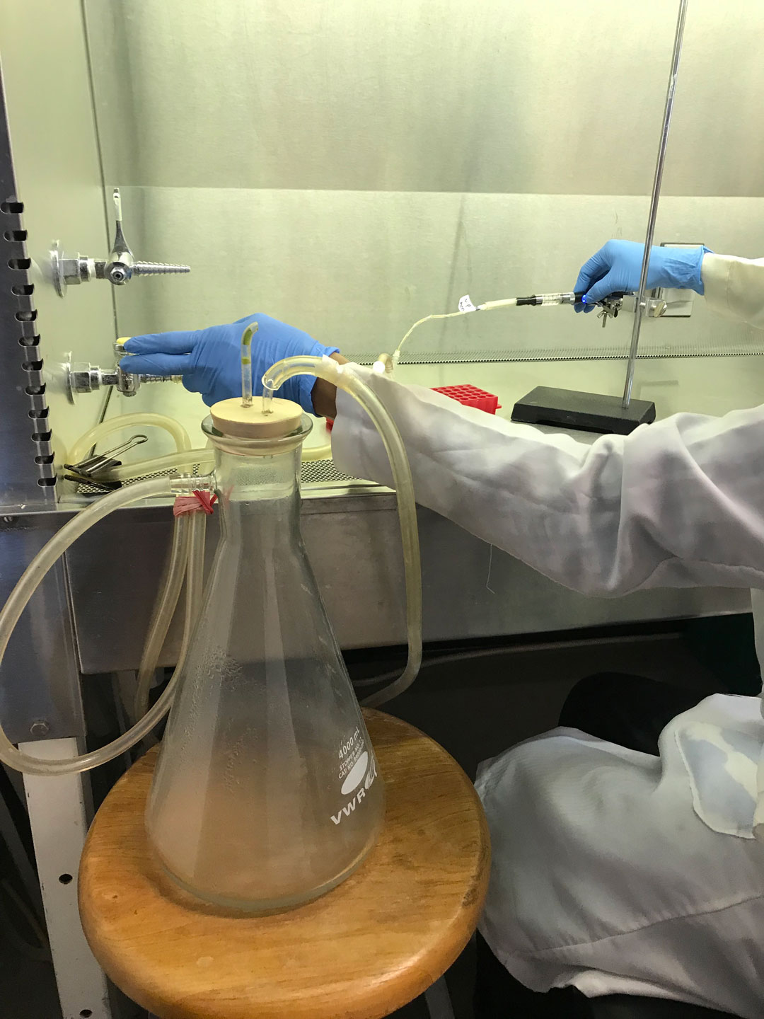 An ASSET team member preparing e-cigarette vapor in the lab