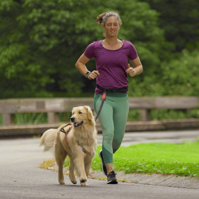 Thumbnail of the woman in this video running with her dog