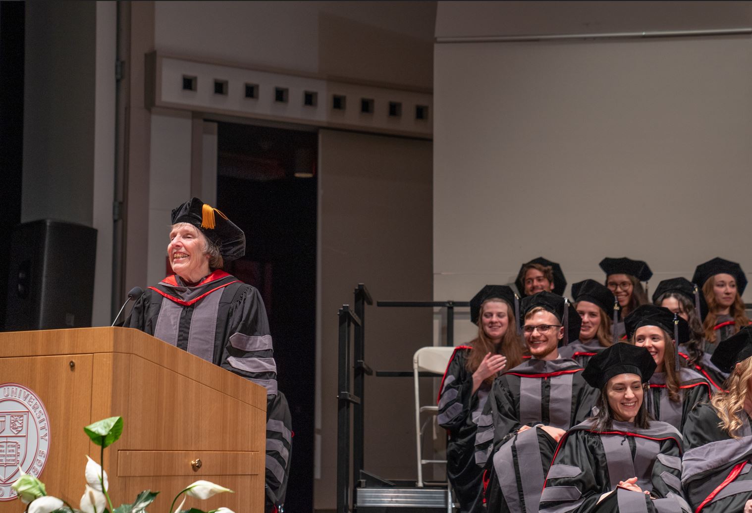 Dr. Mary Smith speaking at hooding 2023