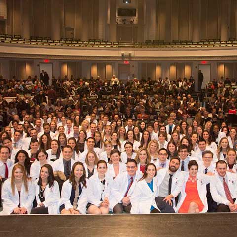 Third-year students attend white coat ceremony