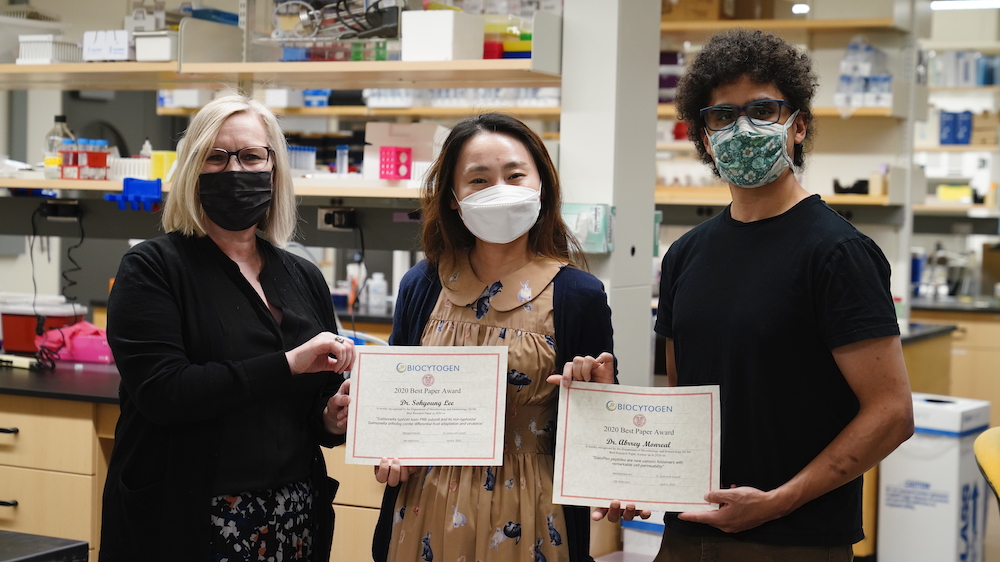 Dr. Deb Fowell with Biocytogen award winners Drs. Sohyoung Lee and Abbrey Monreal