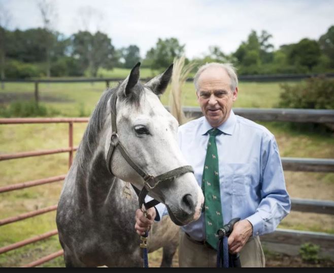 Douglas F. Antczak with a horse