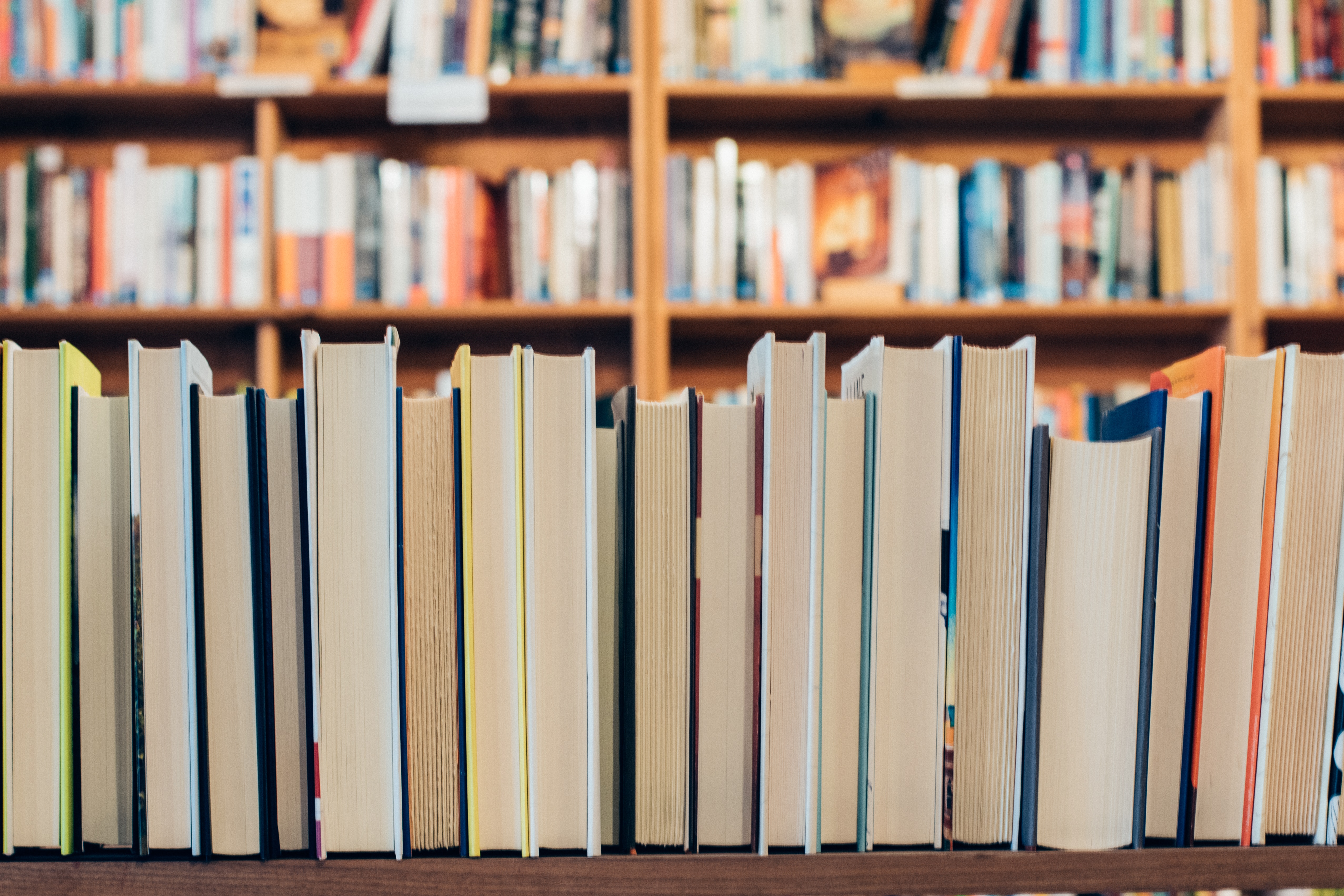 Books stacked in library