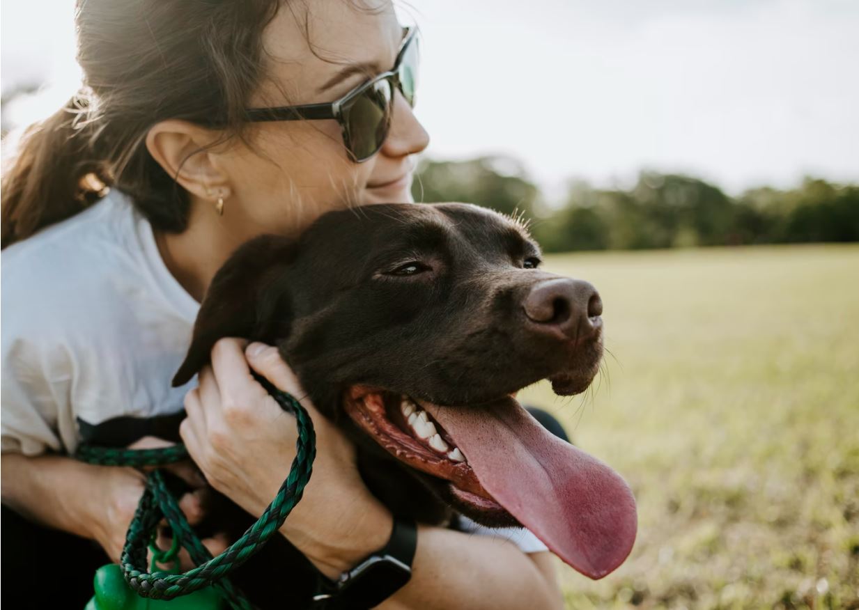 a woman and a dog