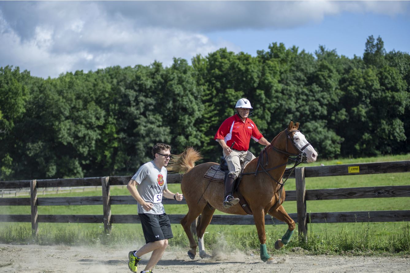 a jogger and a horseback rider