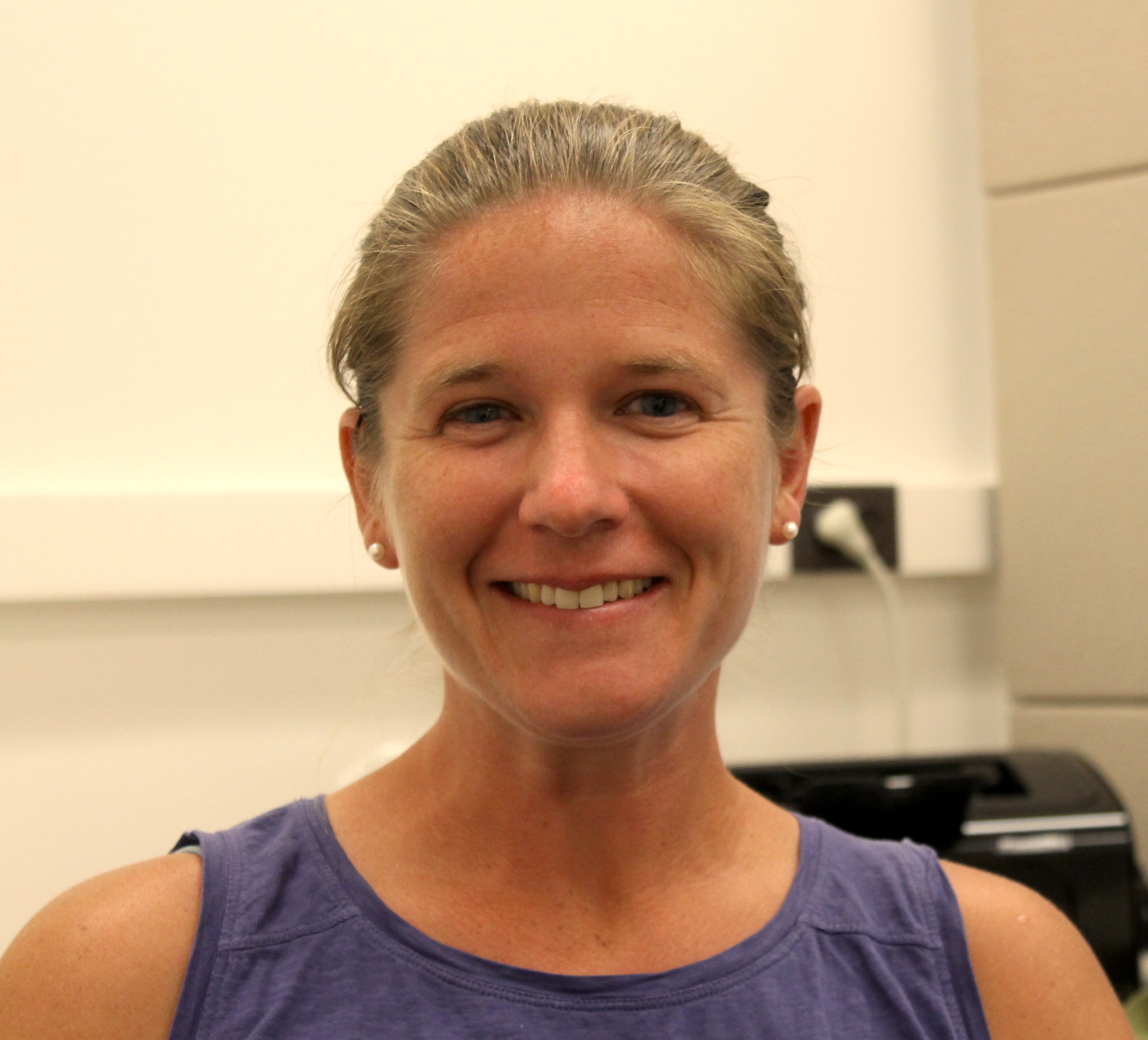 Portrait photograph of Dr. Kelly Lyboldt smiling at the camera