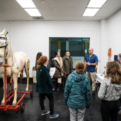 Group of students listening to the doctor 