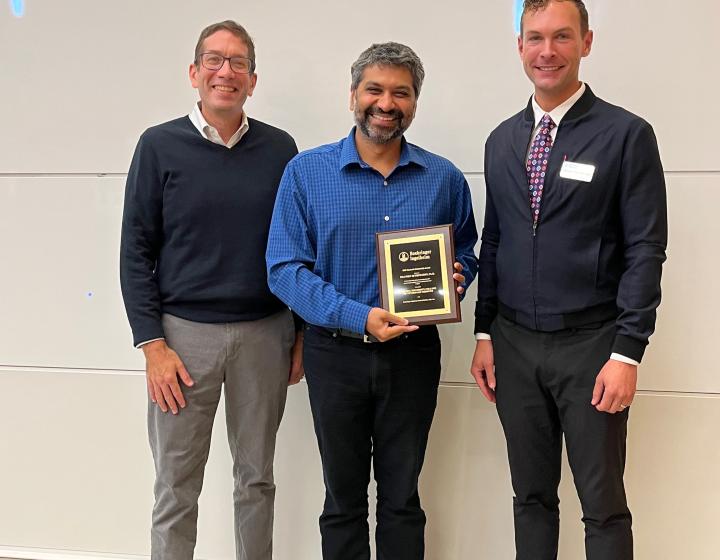 Image of 2022 BI Mentoring Award recipient Praveen Sethupathy w/ Award presenters