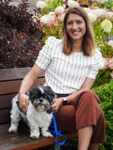 Stephanie Coco with a small black and white dog
