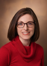 A professional portrait image of Dr. Kristen Ogden.