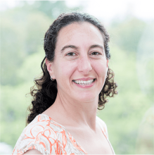 Ilana Brito wearing a floral blouse.