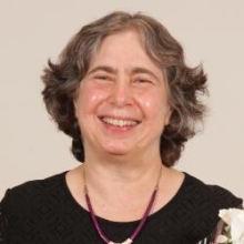 Mariana Wolfner smiling while wearing a black blouse.