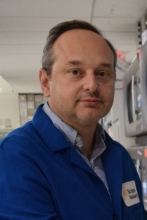 A professional portrait image of Dr. Luiz Sorio De Carvalho.