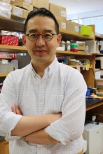 A professional portrait image of Dr. Minsoo Kim.
