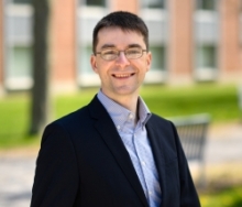A professional portrait image of Dr. Yuri Pritykin.