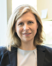 A professional portrait image of Dr. Laura Goodman.