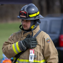 Taylor McGee in a firefighter outfit